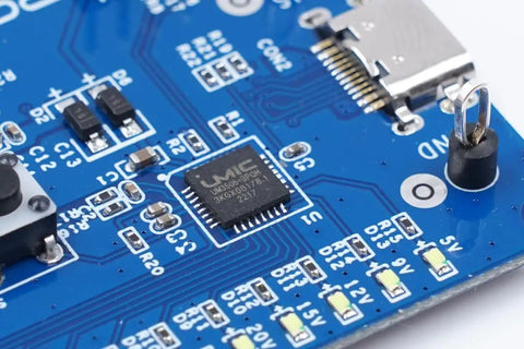 Close-up of Power-Z SINK240 USB PD3.1 Trigger Board USB C Decoy Module 240W 48V PPS AVS Voltage Tester blue circuit board