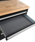 Badass Heavy Duty Tool Chest And Rolling Cabinet Two Pack Workhorse Featuring Twenty Six Deep Slide Out Drawers close-up of spacious black drawer with sleek metal handle.