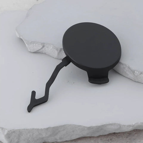 Right Side Tow Hook Eye Cover Cap For Porsche Cayenne 2011 To 2014 Rear Bumper Replacement 95850545000 displayed on stone
