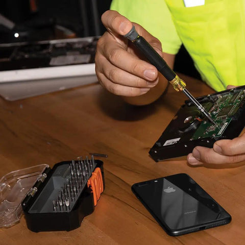 Pro Grade Precision Driver Kit With 39 Bit Multi Screwdriver And All In One Repair Tool For Apple Devices in use repairing a device