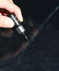 DIY Windshield Repair Kit For Chips And Cracks With Resin Glass Repair Fluid Quick And Easy Fix For Car Windshields Star Shaped Crack Repair Professional Grade being applied to a crack.