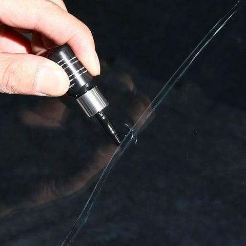 DIY Windshield Repair Kit For Chips And Cracks With Resin Glass Repair Fluid Quick And Easy Fix For Car Windshields Star Shaped Crack Repair Professional Grade being applied to a crack.