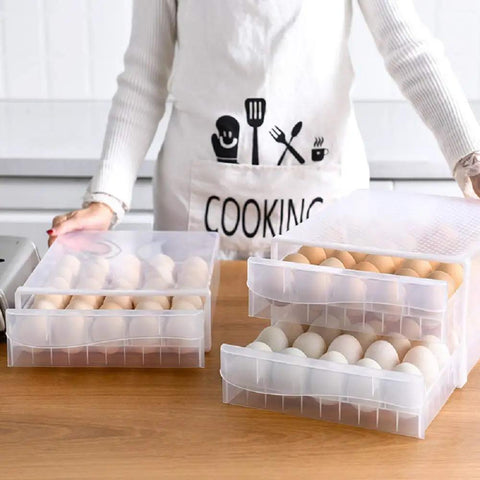 Fridge Egg Holder With 60 Grid Storage, 2 Layer Drawer Style Egg Carrier Box showcased in a kitchen setting, filled with eggs