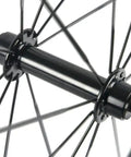 Close-up of hub and spokes on Road Ready Turbo Carbon Wheelset 38 50 60 88mm For 700c Clincher 23mm Wide UD Matte Finish Aero Rim Set