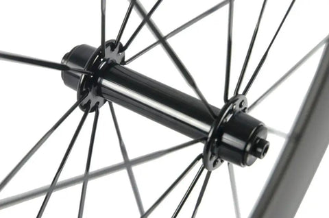 Close-up of hub and spokes on Road Ready Turbo Carbon Wheelset 38 50 60 88mm For 700c Clincher 23mm Wide UD Matte Finish Aero Rim Set
