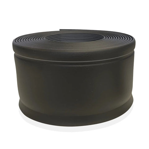 Ultra Thick Black Vinyl Wall Base Self Stick One Eighth Inch Four And A Quarter Inch Tall By Eighty Foot Roll Peel And Stick Adhesive Backing Flexible Floor Base With Toe For Easy DIY Install In Home Garage, coiled view of the black vinyl roll