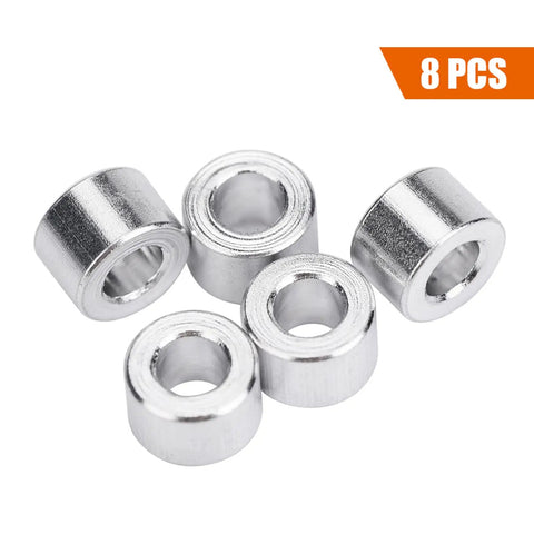 Five aluminum shock spacers, part of an RC Car Shock Spacers Set With Eight Aluminum 6mm Upper Mount Spacers For Axial SCX10 Crawler And Off Road RC Rigs.
