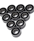 Rubber Sealed RC Ball Bearings Kit 5x8x2.5mm And 5x11x4mm for One Tenth Scale RC Cars in a triangular arrangement.