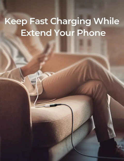 Person using 2 Pack USB 3.0 Extension Cables Type A Male To Female, 6.6 Feet Each, Braided Nylon, for phone charging on sofa