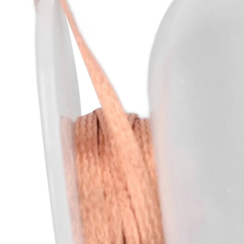 Close-up of Pro Grade Premium Solder Wick Desoldering Braid for Electronics Repair showing red copper wire.