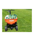 60 Lb Heavy Duty Spreader Workhorse for lawn and garden on grass, sturdy metal frame, smooth operation RB60