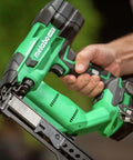Close-up of 18V MultiVolt Cordless Stapler Tool Only No Battery For Quick Cabinet And Trim Jobs, green and black design