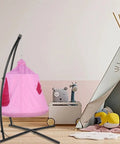 Pink X Shaped Hanging Tree Tent with Swing Chair and Stand Patio Canopy indoors next to play area, 330 lb capacity.
