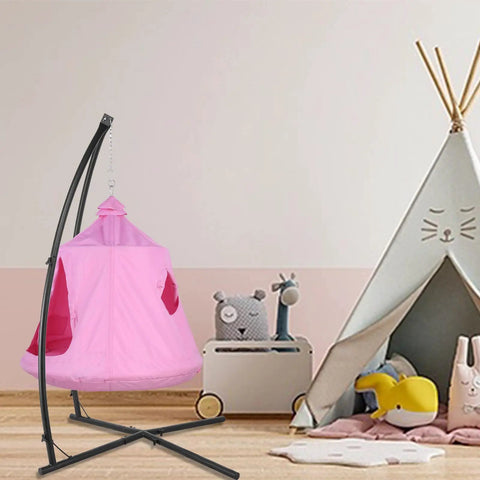 Pink X Shaped Hanging Tree Tent with Swing Chair and Stand Patio Canopy indoors next to play area, 330 lb capacity.