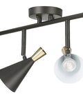 Close-up of Dope Lofty Industrial Four Light Track Lighting Fixture with pivoting black and brass heads.