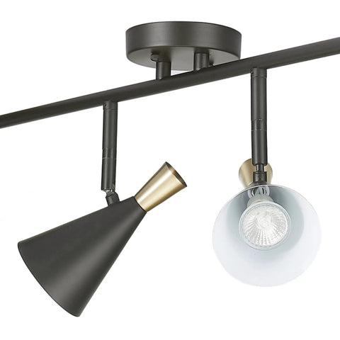 Close-up of Dope Lofty Industrial Four Light Track Lighting Fixture with pivoting black and brass heads.
