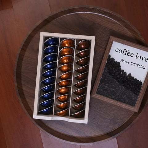 Top view of Coffee Pods Storage Drawer Organizer For Capsules Multi Function Desk And Kitchen Organizer on a wooden tray.