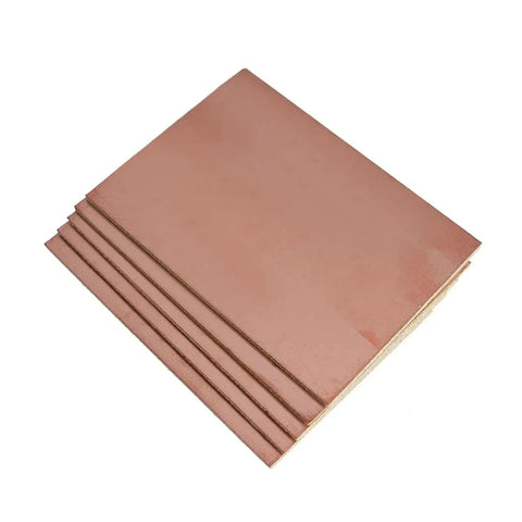 Stack of FR4 Copper Clad Single Sided PCB Boards Five Pack 5x7cm And 10x15cm for DIY projects and prototyping, showing flat copper finish.