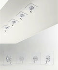 Tough As Nails Adhesive Wall Hooks Heavy Duty Sticky Hangers For Kitchen Living Room Bedroom And Dorm Skip The Drill stainless steel hooks displayed on wall.