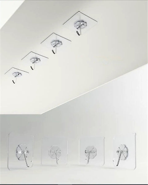 Tough As Nails Adhesive Wall Hooks Heavy Duty Sticky Hangers For Kitchen Living Room Bedroom And Dorm Skip The Drill stainless steel hooks displayed on wall.