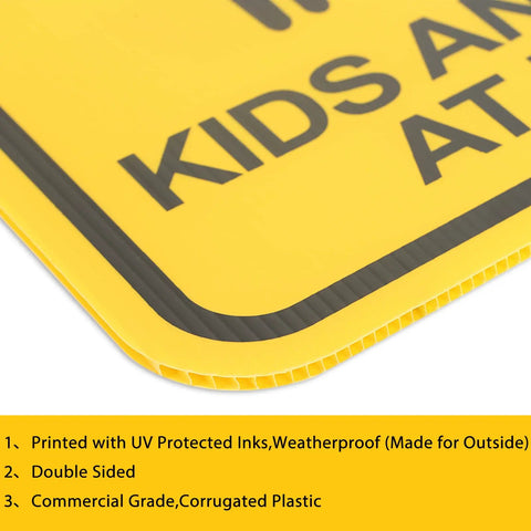 Close-up of a yellow sign corner with printed text, corrugated edge shown, part of Slow Down Signs With H Stake 16x12 Inches Kids And Pets At Play Double Sided Street Safety Signs Waterproof Fade Resistant Weatherproof Durable Pack Of 3 For Driveways And Neighborhoods.
