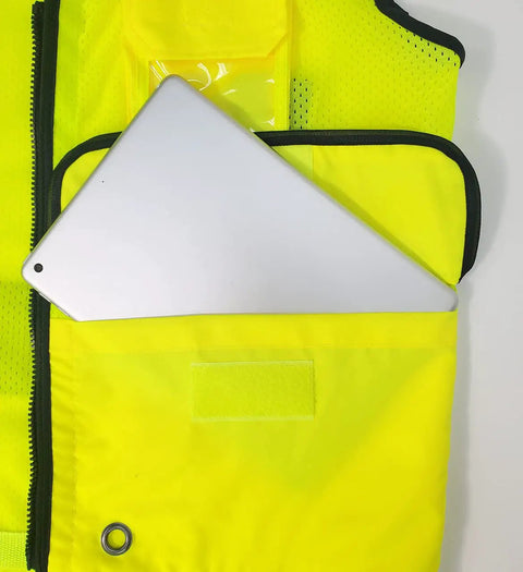 Class 2 High Visibility Safety Vest In Neon Green with a tablet in the pocket, showcasing storage functionality for construction use.