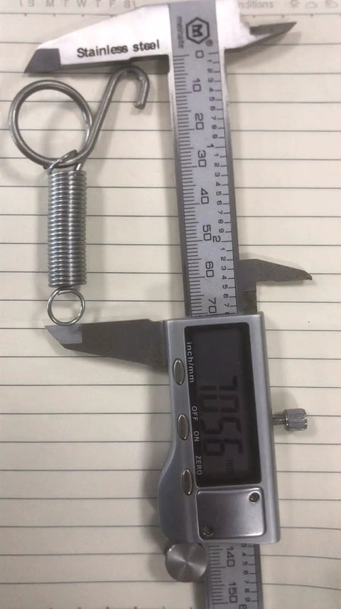 Heavy Duty Stainless Steel Sliding Bolt Lock And Spiral Spring Hardware Set For Rabbit Cage Door Latch with a measuring tool.