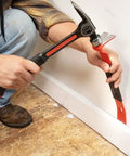 Person using 15 Inch Flat Pry Bar With Grip For Demolition And Prying Nails Precision Ground Edges Beveled Nail Slots rusty-resistant finish