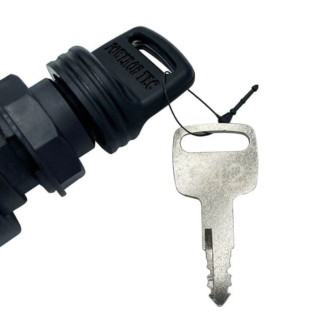 Close-up of Boat Ignition Switch With Key Replacement For Mercury Mariner Outboard Motors, showing key and switch detail.