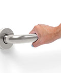 A hand holding Two Pack Stainless Steel Bath Safety Grab Bars One And A Quarter Inch By Twelve Inch ADA Compliant Heavy Duty 500 Pound Support Oil Rubbed Bronze For Bathroom Shower Tub And Home Safety.