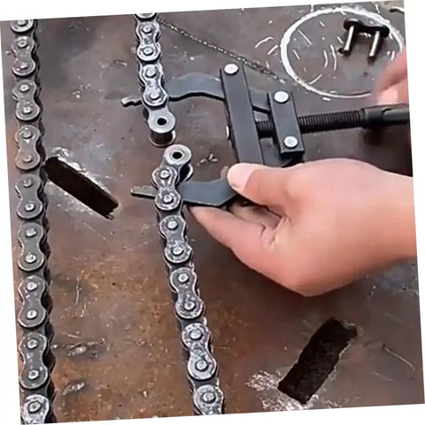 Heavy Duty Dirtbike Chain Tensioner And Motorcycle Chain Adjuster Hand Tool crafted from hella tough steel adjusts a chain.