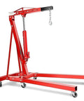 Professional Grade Foldable Hydraulic Engine Hoist Shop Crane With Heavy Duty Rolling Casters one ton, red steel frame with adjustable boom.