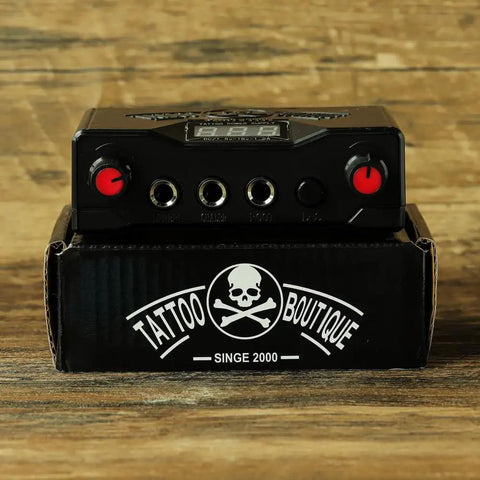 Dual Rotary Tattoo Machine Kit For Beginners With Power Supply And Foot Pedal power supply on box.