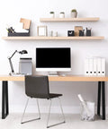 Modern desk with computer and chair, featuring 19 Inch Hairpin Table Legs Set Of 4 For DIY Coffee Tables, Desks, And Night Stands in black iron.