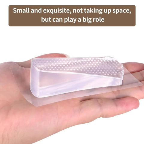 Two Pack Clear Silicone Door Stoppers Set for Floor or Wall Use shown on a hand, illustrating size and silicone material