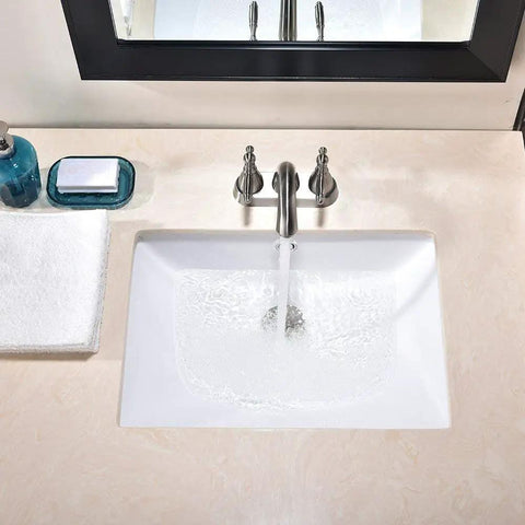 Modern Rectangular Undermount Bathroom Sink 18.5 By 13.8 By 7.9 Inches White Ceramic Lavatory With Overflow in use