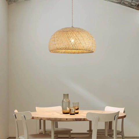 Roomy Bamboo Plug In Pendant Light With Dimmable Switch And 14 Foot Handmade Woven Cord above a wooden dining table.