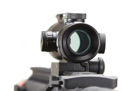 Close-up of red dot sight on Gen 2 M4 SPR Interceptor Polymer Airsoft AEG with enclosed red dot sight and top optic rail.