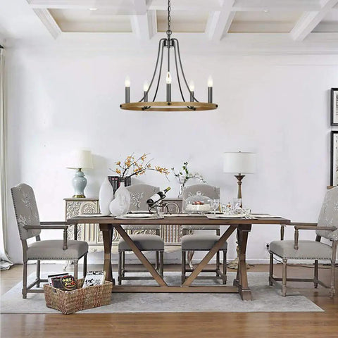 Dining room with Five Light Farmhouse Chandelier with Vintage Candle Look Black Finish hanging above table, 22.8 Inch light fixture.