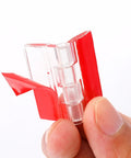 Slick Transparent Acrylic Hinges And Self Adhesive Latch Buckles Kit showing hinge strip with adhesive backing in hand.