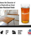 Pure Tung Oil For Wood Finishing Top Notch Waterproof Sealant For Cutting Boards and Countertops shown with kitchen and oil container