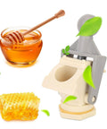 Ergonomic Honey Gate Valve With Ball Handle Plastic Tap and honeycomb for beekeeping bottling and honey extractor equipment.