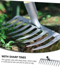 11-Prong Steel Grass Plowing Rake with sharp tines for soil tilling and hay raking, shown on grass