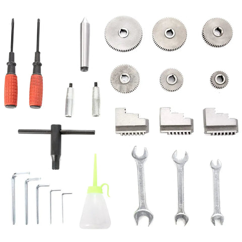 Tool kit including wrenches, gears, and screwdrivers for Garage Ready Mini Metal Lathe With One Point One Kw Motor.