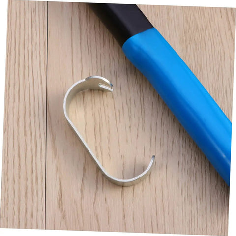 Top Notch 86 Piece Heavy Duty Rivet Nut Kit With M5 M7 M8 Threaded Inserts Perfect For Steel Metal Work, Duct Repair, And Awesome DIY Projects Comes In Sturdy Storage Case For Pros and Amateurs. Silver rivet nut insert beside blue-handled setting tool on wood surface