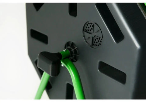 Close-up view of the black and green Hotfrog Dual Chamber Tumbling Composter On Wheels For No Fuss Easy Turning 37 Gallon Outdoor Garden Bin Rotating Compost Bin Built To Turn Kitchen Scraps And Yard Waste Into Rich Soil Black And Green handle and chamber