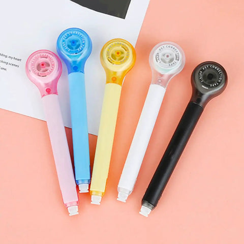 Smooth As Butter Pen Style Correction Tape Rollers With Zero Stink And Zero Drama Glide For Fast Edits in assorted colors.