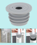 Two Pack Flexible Silicone Drain Plug For Washing Machines And Floor Drains shows gray silicone plug in use for sealing drains.