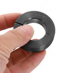Hand holding Single Split Shaft Collar 1-1/16 Bore 1-7/8 OD 1/2 Thick One Piece Clamping Collar With Set Screw Lock Steel Black Oxide