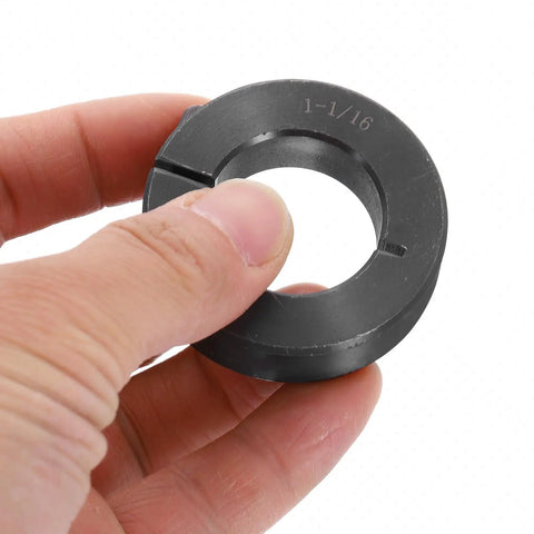Hand holding Single Split Shaft Collar 1-1/16 Bore 1-7/8 OD 1/2 Thick One Piece Clamping Collar With Set Screw Lock Steel Black Oxide